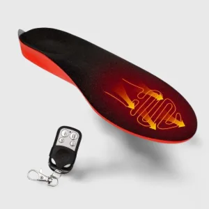 Photo de près des semelles chauffantes pour motoneige insérées dans une botte. Idéal pour Accessoires chauffants et Semelle chauffante.