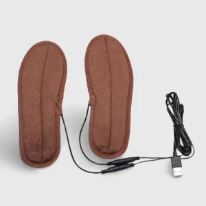 Gros plan sur la texture antidérapante de la Semelle Chauffante Ski, assurant une adhérence optimale dans la chaussure. Indispensable semelle chauffante.